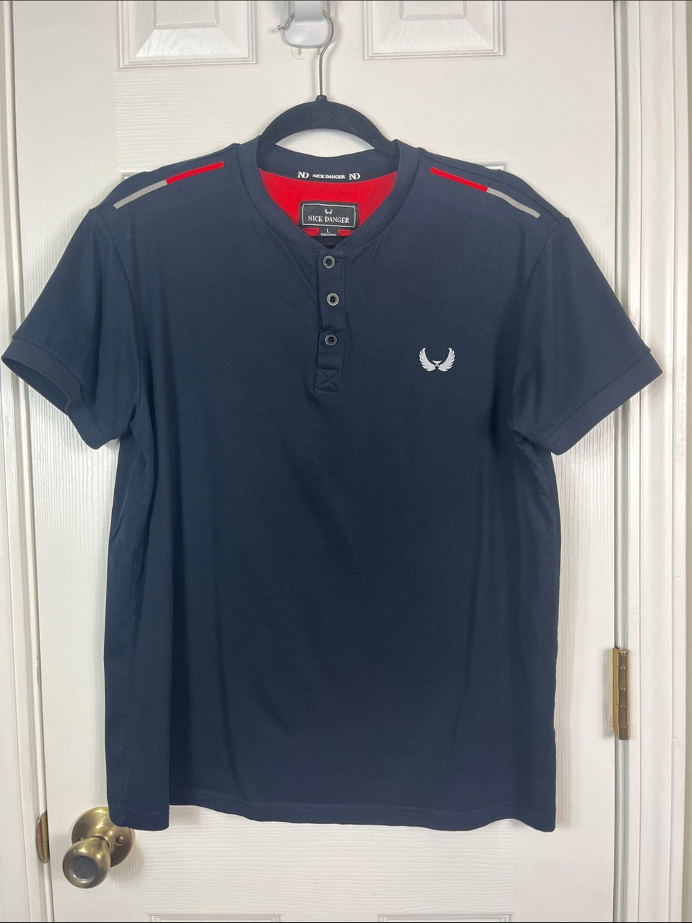 Nick Danger navy blue short sleeved 3 button tee shirt size large. 95% cotton